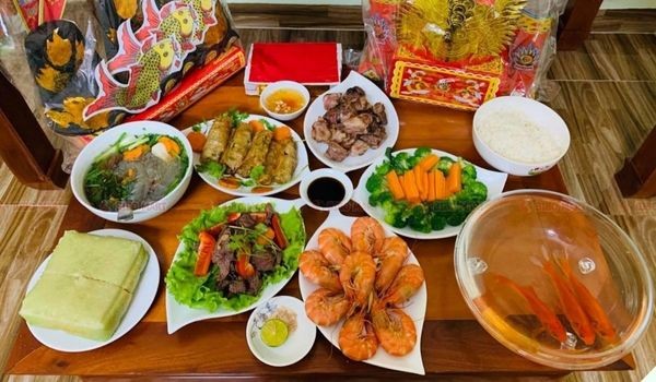 Đặt cá chép cùng đồ cúng